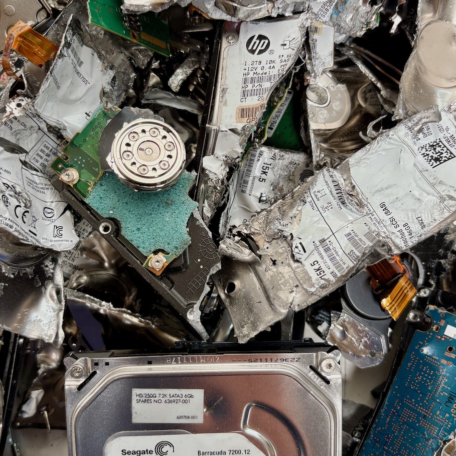 A room full of computer equipment and boxes.